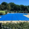Merlin 10-Year Solid Safety Cover With Drain Panel | Rectangle 16' X 32' | 1' Or 2' Offset 4' X 8' Right Side Step | Blue | 25W-X-BU