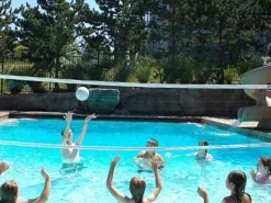 SR Smith Swim N' Spike Commercial Volleyball Set | 32' Net With Anchors & Stainless Steel Poles | For Pools 30' To 36' In Width | VOLYC32